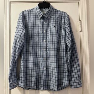 Properly tied Boys Blue Plaid Button-Down Shirt with Logo